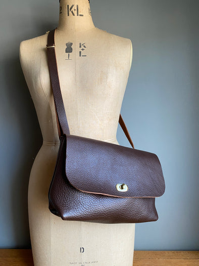 Dark brown leather satchel bag