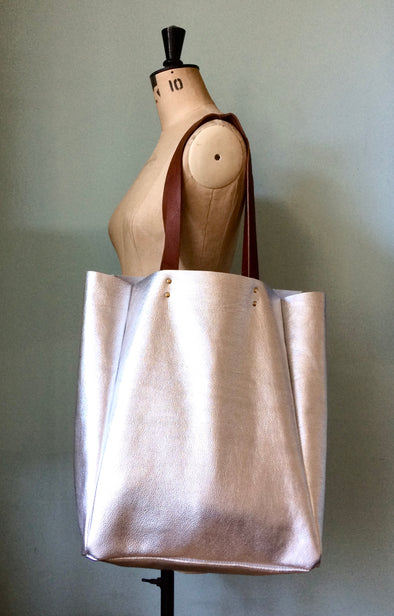 Silver leather bag with shoulder strap