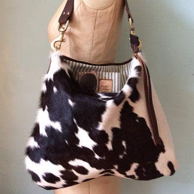 Dumpling messenger bag in cowhair and leather