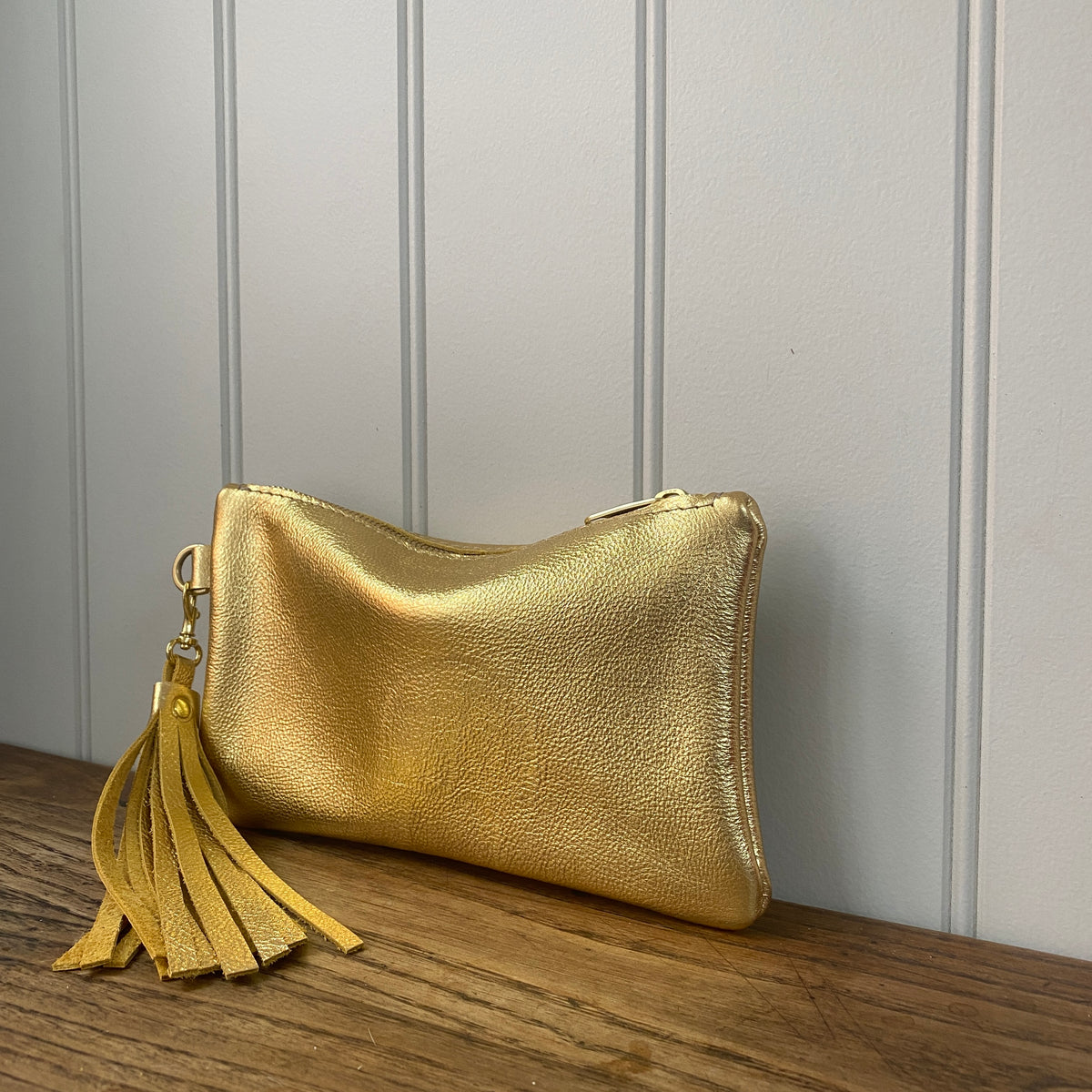 gold leather clutch