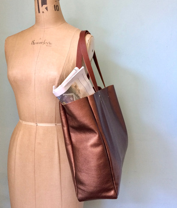 Bronze Morse leather tote bag