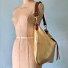 Gold leather evening bag with shoulder strap