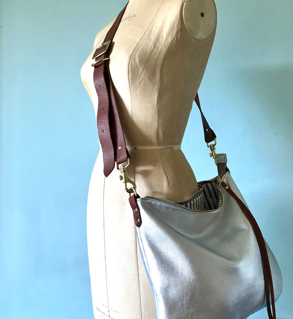 Silver leather Dumpling messenger bag with crossbody or shoulder strap