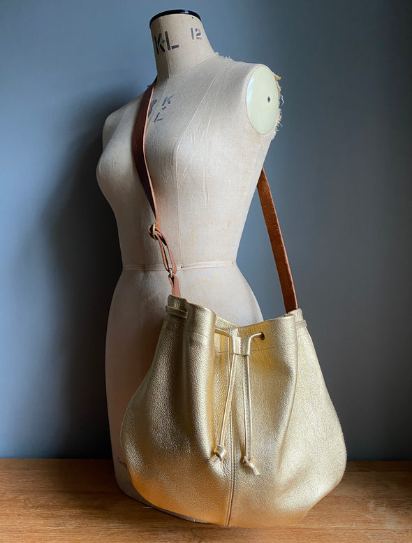 Leather drawstring Edith Plum crossbody bucket bag in gold