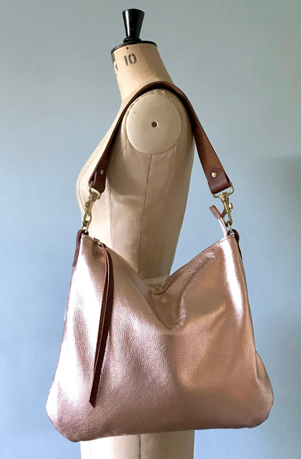 Dumpling messenger bag in rose gold leather - crossbody / shoulder bag