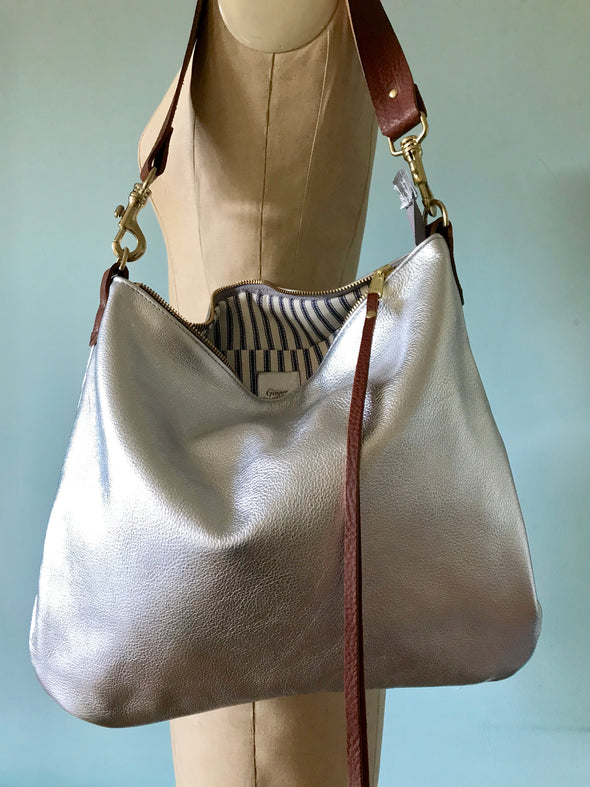 Silver leather Dumpling messenger bag with crossbody or shoulder strap