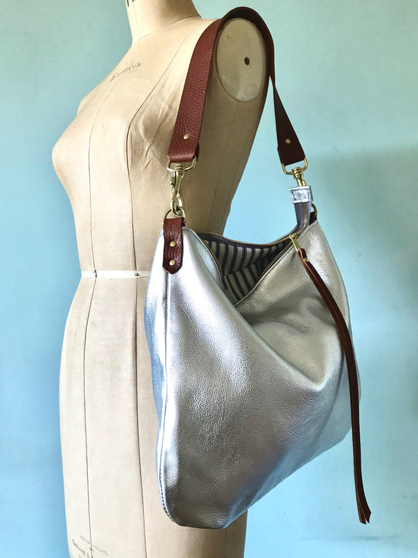 Silver leather Dumpling messenger bag with crossbody or shoulder strap