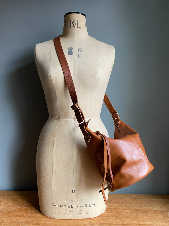 brown leather bucket bag