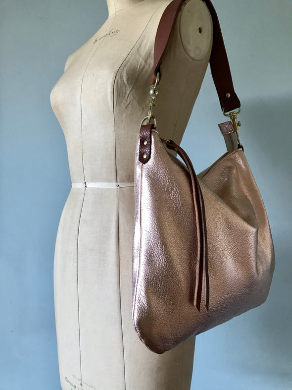 Dumpling messenger bag in rose gold leather - crossbody / shoulder bag