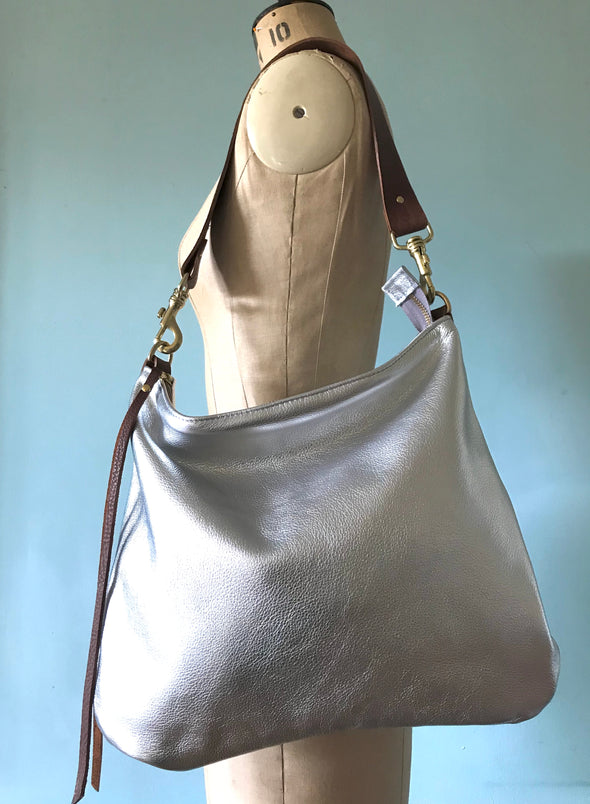 Silver leather Dumpling messenger bag with crossbody or shoulder strap