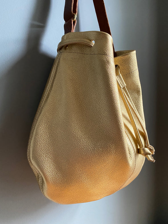 Leather drawstring Edith Plum crossbody bucket bag in gold