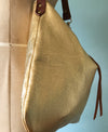 Gold leather evening purse with shoulder strap