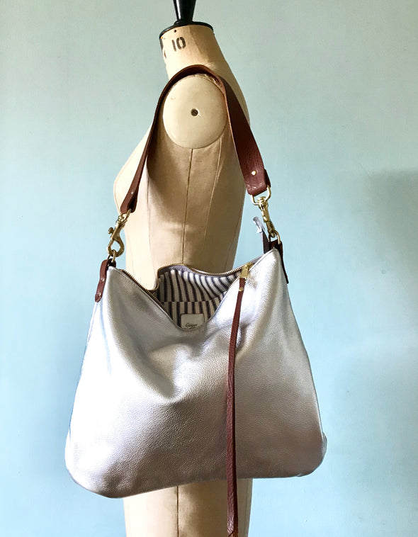 Silver leather Dumpling messenger bag with crossbody or shoulder strap Ginger and Brown