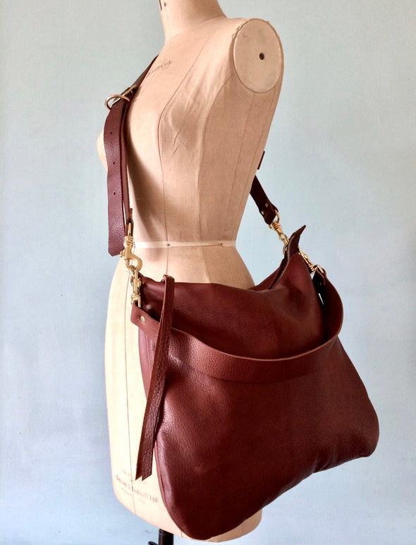 Dumpling messenger bag in rose gold leather - crossbody / shoulder bag