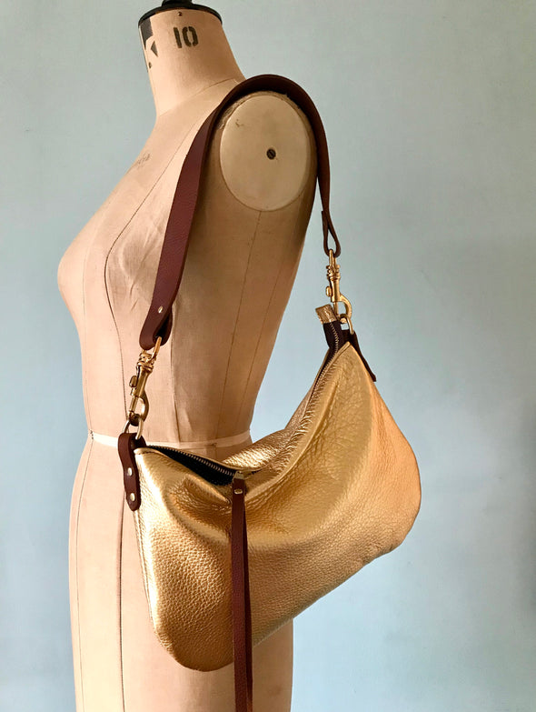 gold leather evening purse with shoulder strap