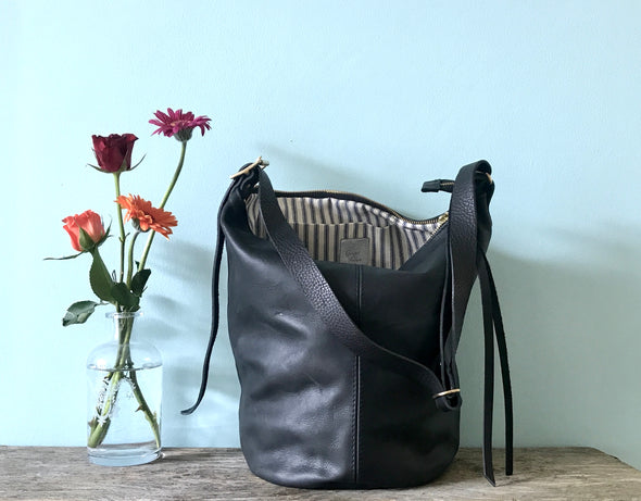 black leather crossbody bucket bag