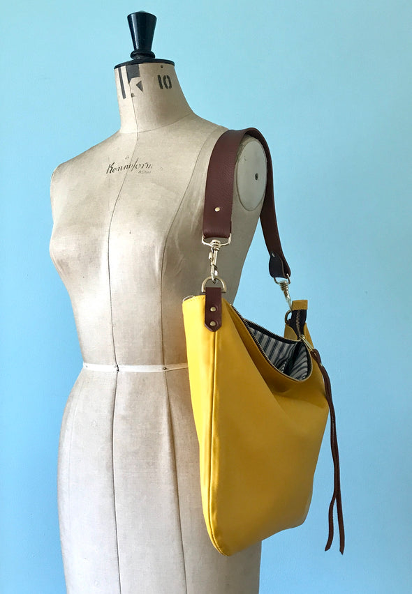 Dumpling messenger bag in yellow - crossbody / shoulder bag