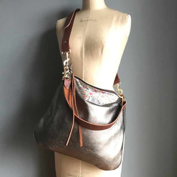 Dumpling messenger bag in gunmetal leather - crossbody / shoulder bag