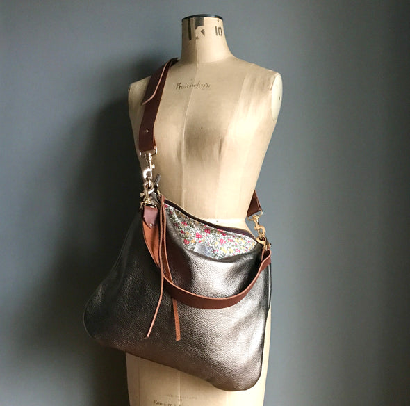 Dumpling messenger bag in gunmetal leather - crossbody / shoulder bag