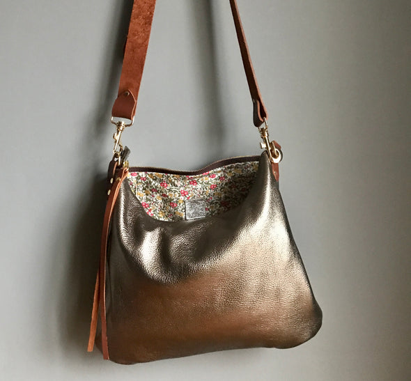 Dumpling messenger bag in gunmetal leather - crossbody / shoulder bag