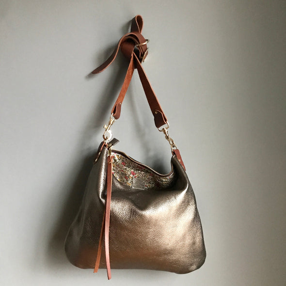 Dumpling messenger bag in gunmetal leather - crossbody / shoulder bag