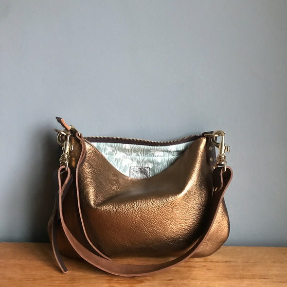 Bronze metallic leather purse with shoulder strap