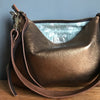 Bronze leather handbag with shoulder strap