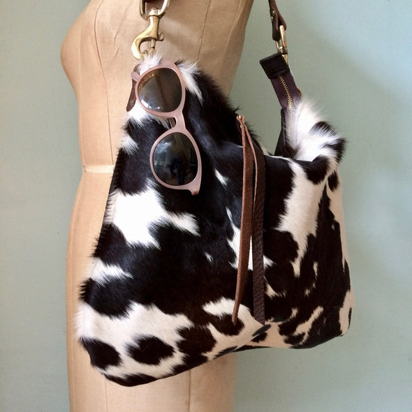 Dumpling messenger bag in cowhair and leather