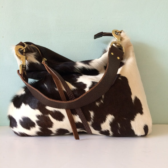 Dumpling messenger bag in cowhair and leather