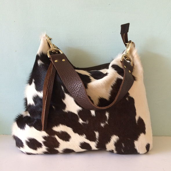 Dumpling messenger bag in cowhair and leather