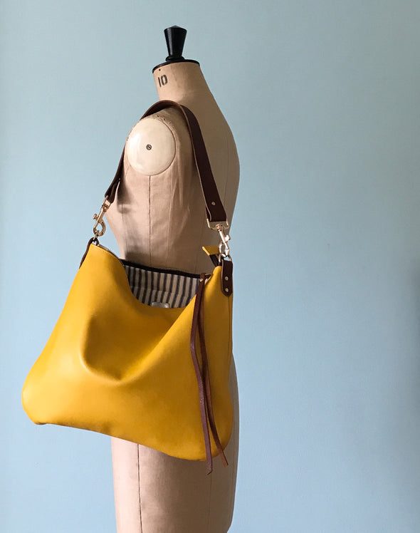 Dumpling messenger bag in yellow - crossbody / shoulder bag